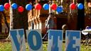 Students on the campus of the University of Pittsburgh walk past a ‘vote’ sign on Election Day, Nov. 5., 2024. Students on the campus of the University of Pittsburgh walk past a ‘vote’ sign on Election Day, Nov. 5., 2024.