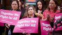 Public officials and members of Planned Parenthood at a 2022 press conference about the overturning of Roe v. Wade. Public officials and members of Planned Parenthood at a 2022 press conference about the overturning of Roe v. Wade.