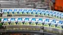 Milk cartons on a production line. Milk cartons on a production line.