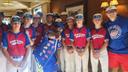 Mayor JoJo Burgess of Washington, Pa., poses with the Washington County baseball team.