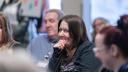 Erika Shambaugh and other audience members listen during a “Voices of the Epidemic” forum hosted by Spotlight PA in April 2025 in Berks County.