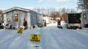 A “no data centers” sign sits in front of a home in Valley View Estates, which is set to be surrounded by data centers.