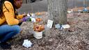 A woman cleans up the Black Lives Matter memorial at the Dr. Martin Luther King Jr. Plaza in downtown State College. A woman cleans up the Black Lives Matter memorial at the Dr. Martin Luther King Jr. Plaza in downtown State College.
