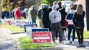 Voters stand in line outside a Pennsylvania polling place. Voters stand in line outside a Pennsylvania polling place.