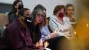 Gareth Hall, left, and his wife Fe Hall, right, look on during a vigil for their late son Christian Hall in December. Their lawsuit claims troopers used excessive force, killing Hall as he tried to surrender and after they said they would not shoot him. Gareth Hall, left, and his wife Fe Hall, right, look on during a vigil for their late son Christian Hall in December. Their lawsuit claims troopers used excessive force, killing Hall as he tried to surrender and after they said they would not shoot him.