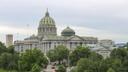 House lawmakers voted 104-97 to approve the main budget bill and expected late Friday to also consider the enabling fiscal code, which provides spending instructions. House lawmakers voted 104-97 to approve the main budget bill and expected late Friday to also consider the enabling fiscal code, which provides spending instructions.