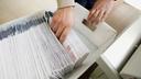 Mail ballots are sorted and counted by workers on Election Day in 2020.