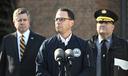 Gov. Josh Shapiro (center) is flanked by Dauphin County DA Fran Chardo (left) and Colonel Christopher Paris of the State Police