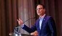 Gov. Josh Shapiro stands at a lectern.