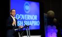 Gov. Josh Shapiro speaks at a podium.