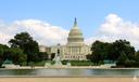 A summer view of the Capitol Reflecting Pool, Grant Memorial and U.S. Capitol Building.