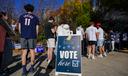 People wait in line to vote Nov. 5, 2024, at the Banana Factory in Bethlehem, Pa.