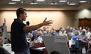 Conor Lamb speaks to the crowd at a town hall-style event organized by progressive groups at Central Penn College in Enola, PA.