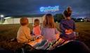 Children watch the inaugural Goose Day drone light show in downtown Lewistown in 2023.
