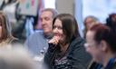 Erika Shambaugh and other audience members listen during a “Voices of the Epidemic” forum hosted by Spotlight PA in April 2025 in Berks County.