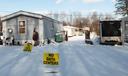 A “no data centers” sign sits in front of a home in Valley View Estates, which is set to be surrounded by data centers.