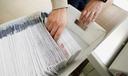 Mail ballots are sorted and counted by workers on Election Day in 2020.