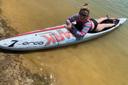 Amanda Parezo rides a paddleboard Amanda Parezo rides a paddleboard