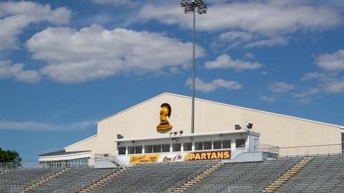 The campus of the Milton Hershey School is shown with the football stadium and the gym rising up behind The campus of the Milton Hershey School is shown with the football stadium and the gym rising up behind