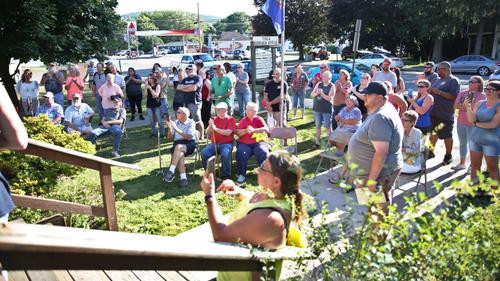 The July 12 special meeting, when Loehmann’s withdrawal from the police position was on the agenda, had to be moved outside to accommodate the crowd size. The July 12 special meeting, when Loehmann’s withdrawal from the police position was on the agenda, had to be moved outside to accommodate the crowd size.