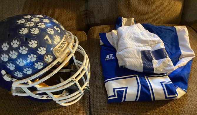 Isaiah Compton's football helmet and jerseys are seen at his parents’ home in Tioga County. Isaiah Compton's football helmet and jerseys are seen at his parents’ home in Tioga County.
