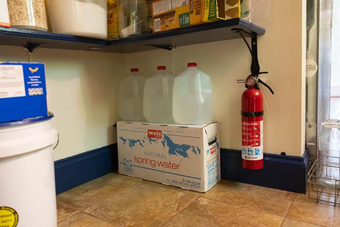 Linnet Brooks, a Rock Spring Water Company customer, keeps bottled water in her pantry due to frequent outages. Linnet Brooks, a Rock Spring Water Company customer, keeps bottled water in her pantry due to frequent outages.