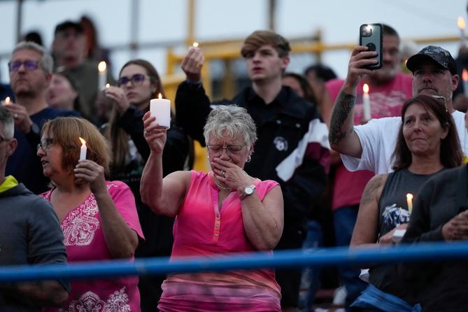Family, friends and community attend a candlelight vigil for Corey Comperatore at Lernerville Speedway in Sarver, Pennsylvania. Family, friends and community attend a candlelight vigil for Corey Comperatore at Lernerville Speedway in Sarver, Pennsylvania.
