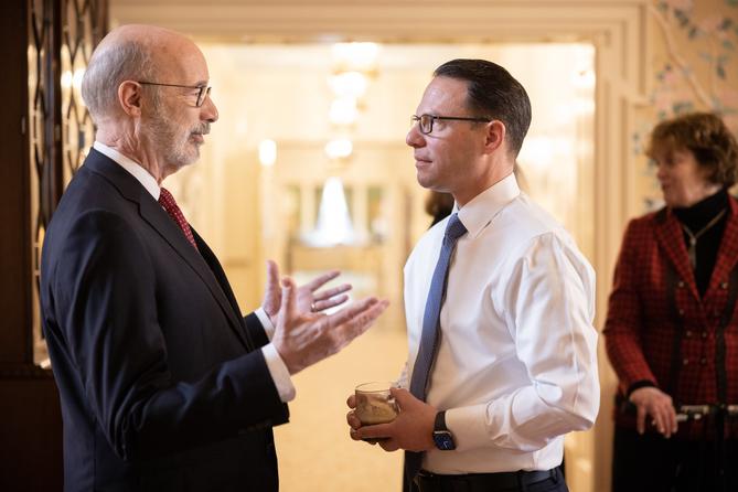 Former Gov. Tom Wolf (left) speaks to Gov. Josh Shapiro (right) Former Gov. Tom Wolf (left) speaks to Gov. Josh Shapiro (right)