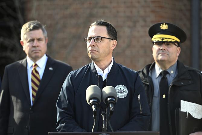 Gov. Josh Shapiro (center) is flanked by Dauphin County DA Fran Chardo (left) and Colonel Christopher Paris of the State Police. Gov. Josh Shapiro (center) is flanked by Dauphin County DA Fran Chardo (left) and Colonel Christopher Paris of the State Police.