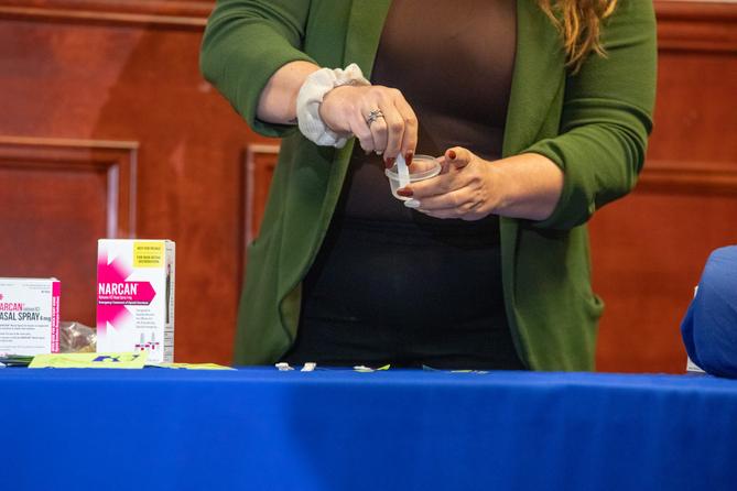 A person demonstrates how to use drug test strips. A person demonstrates how to use drug test strips.