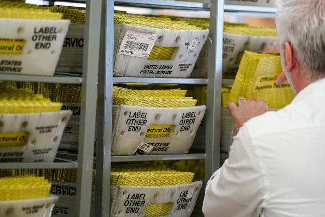 Workers sort mail ballots on Nov. 5, 2024, at Northampton County Courthouse.