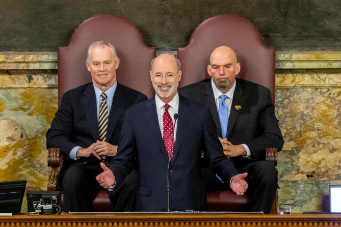 Pennsylvania Gov. Tom Wolf delivers his 2020-21 budget address in the state House of Representatives as Speaker Mike Turzai, left, and Lt. Gov. John Fetterman, right, look on, on Feb. 4, 2020, in Harrisburg, Pa Pennsylvania Gov. Tom Wolf delivers his 2020-21 budget address in the state House of Representatives as Speaker Mike Turzai, left, and Lt. Gov. John Fetterman, right, look on, on Feb. 4, 2020, in Harrisburg, Pa