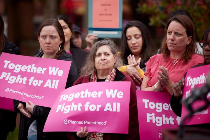 Public officials and members of Planned Parenthood at a 2022 press conference about the overturning of Roe v. Wade. Public officials and members of Planned Parenthood at a 2022 press conference about the overturning of Roe v. Wade.