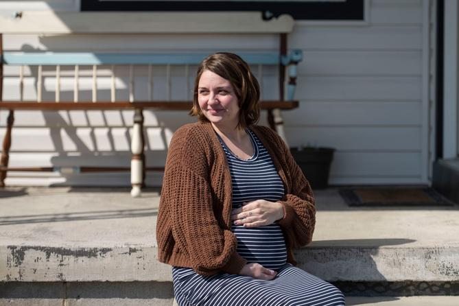 Jessie Larabee, who is pregnant, poses for a photograph outside her St. Marys home. Jessie Larabee, who is pregnant, poses for a photograph outside her St. Marys home.