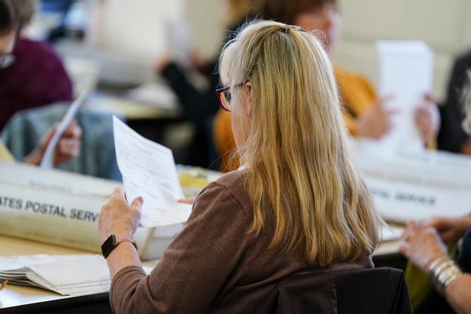 Workers sort mail ballots on primary Election Day 2024 at Northampton County Courthouse in Easton, Pennsylvania. Workers sort mail ballots on primary Election Day 2024 at Northampton County Courthouse in Easton, Pennsylvania.
