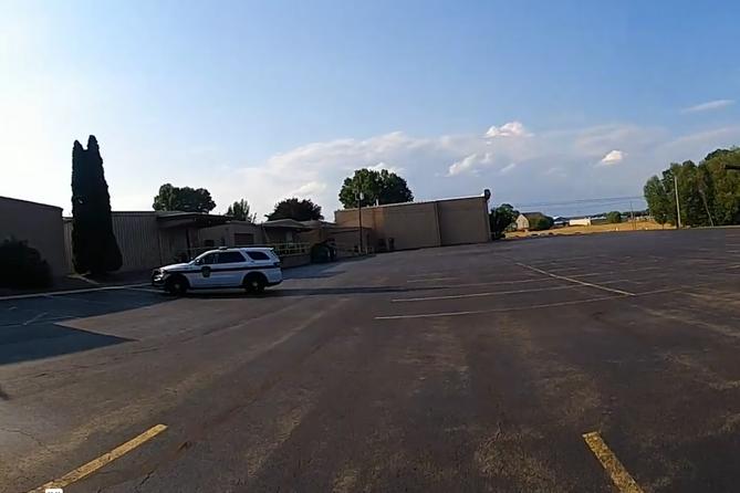 Bodycam footage shows a police officer moving toward the AGR building after Thomas Crooks shot at Trump. Bodycam footage shows a police officer moving toward the AGR building after Thomas Crooks shot at Trump.