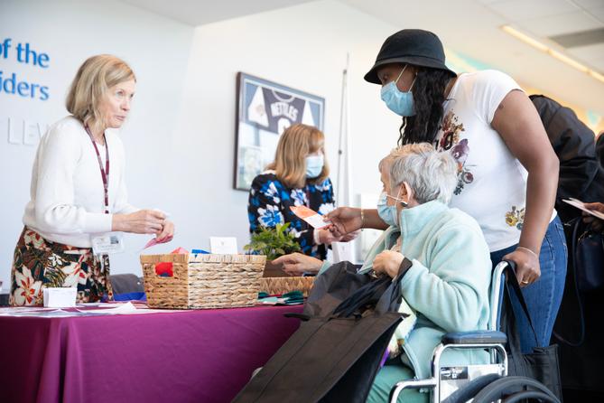 Women speak at a 2023 senior health fair in Moosic, Pennsylvania. Women speak at a 2023 senior health fair in Moosic, Pennsylvania.
