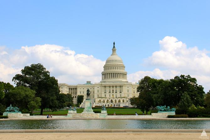 A summer view of the Capitol Reflecting Pool, Grant Memorial and U.S. Capitol Building.
