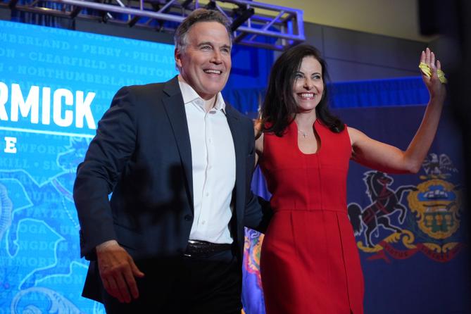 Dave McCormick, left, arrives to speak with his wife, Dina Powell, during an election night watch party, Wednesday, Nov. 6, 2024, in Pittsburgh. Dave McCormick, left, arrives to speak with his wife, Dina Powell, during an election night watch party, Wednesday, Nov. 6, 2024, in Pittsburgh.