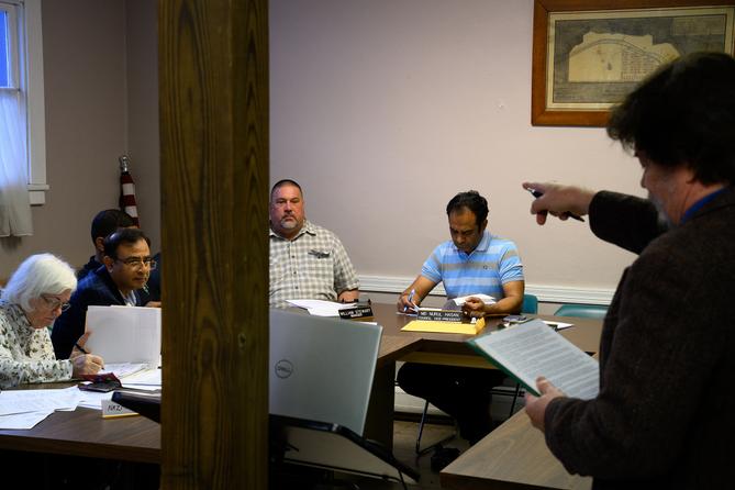 Tom Kramer, former mayor of Millbourne, points at Council Vice President Md Nurul Hasan during a council meeting. Tom Kramer, former mayor of Millbourne, points at Council Vice President Md Nurul Hasan during a council meeting.