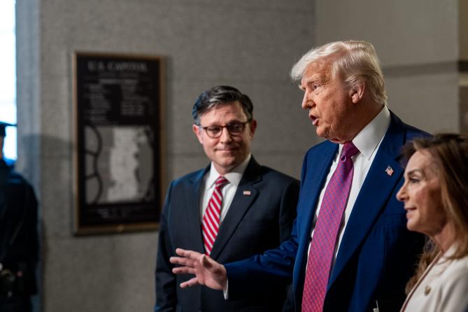 President Donald Trump and Speaker of the House Mike Johnson (R., La.) speak to members of the media at the U.S. Capitol in Washington, D.C., Tuesday, May 20, 2025, before meeting with the House GOP Conference about passing Trump's budget bill.