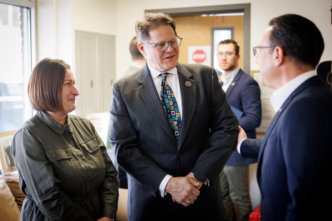 State Rep. Tim Twardzik (R., Schuylkill), center, speaks with Gov. Josh Shapiro.