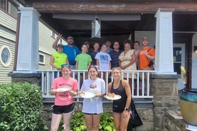Mayor Michele Bannon (third from right in top row) poses with Group Mission Trips volunteers at a small home repairs project in Carbondale. Mayor Michele Bannon (third from right in top row) poses with Group Mission Trips volunteers at a small home repairs project in Carbondale.