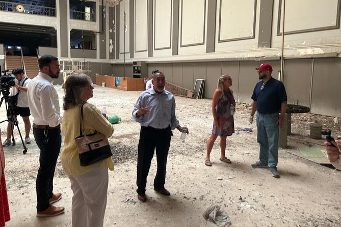 Officials tour the inside of the Reading Trust Company building on Penn Street in Reading.
