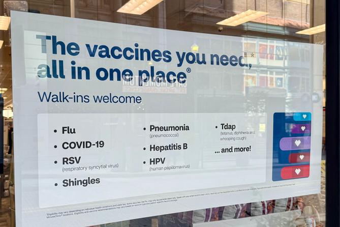 A flyer advertising vaccine services outside a CVS in Downtown Pittsburgh. A flyer advertising vaccine services outside a CVS in Downtown Pittsburgh.