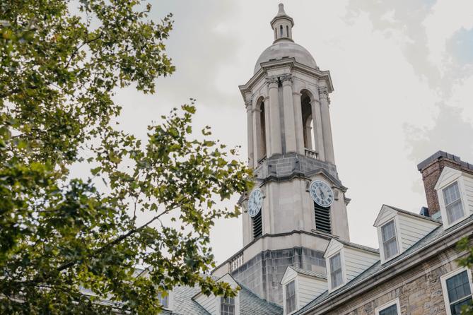 The bell tower of Old Main on Penn State's campus.