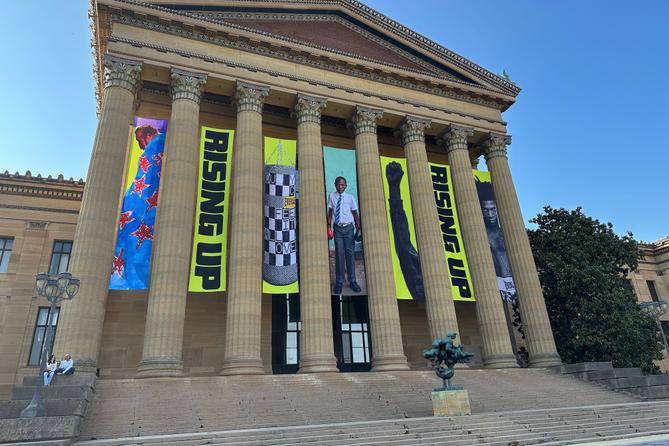 Banners for the "Rising Up: Rocky" exhibition hang outside of the Philadelphia Museum of Art in Philadelphia.