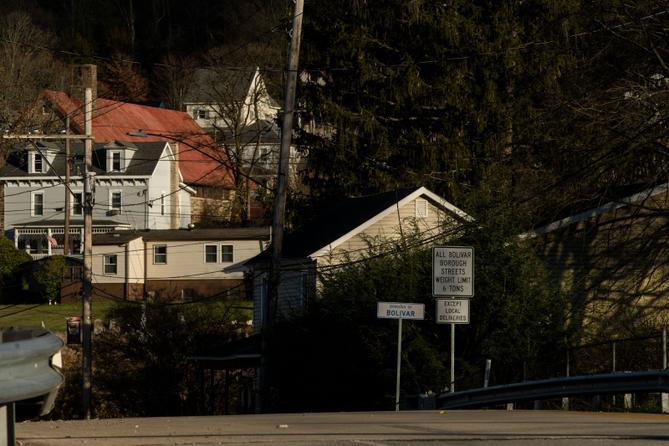 A sign greets drivers to Bolivar, Pennsylvania, with local homes in the background. It is the home of FAVOR ~ Western PA, which provides syringe services. A sign greets drivers to Bolivar, Pennsylvania, with local homes in the background. It is the home of FAVOR ~ Western PA, which provides syringe services.
