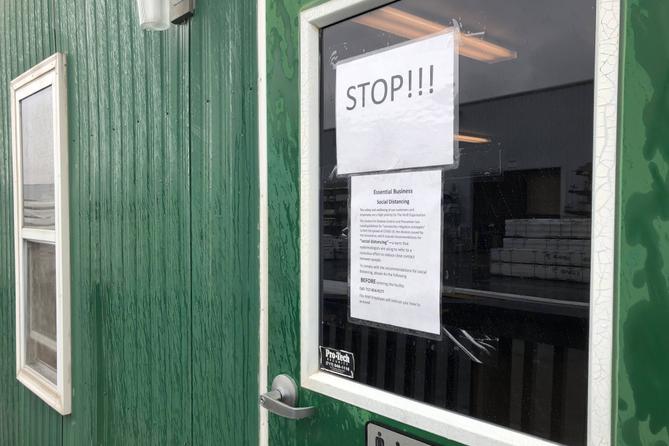 On March 25, signs at a distribution center for Wolf Home Products in York County described it as an "Essential Business" and listed social distancing steps. On March 25, signs at a distribution center for Wolf Home Products in York County described it as an "Essential Business" and listed social distancing steps.