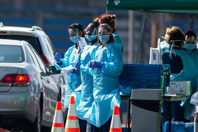 New guidance says surgical face masks should be used rather than the more protective N95 respirators in most situations. New guidance says surgical face masks should be used rather than the more protective N95 respirators in most situations.
